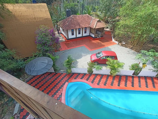 5BHK Pool Villa in Wayanad with Private River Stream – Luxury Nature Retreat